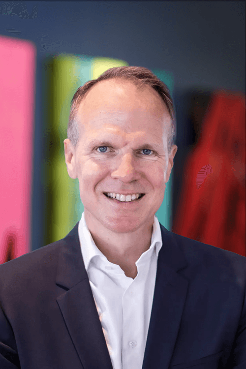 Professional portrait of Wolfspeed CEO and board member Robert Feurle.